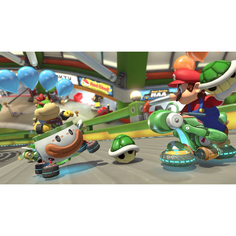Captura de pantalla del gameplay de Mario Kart 8 Deluxe para Nintendo Switch mostrando una emocionante carrera