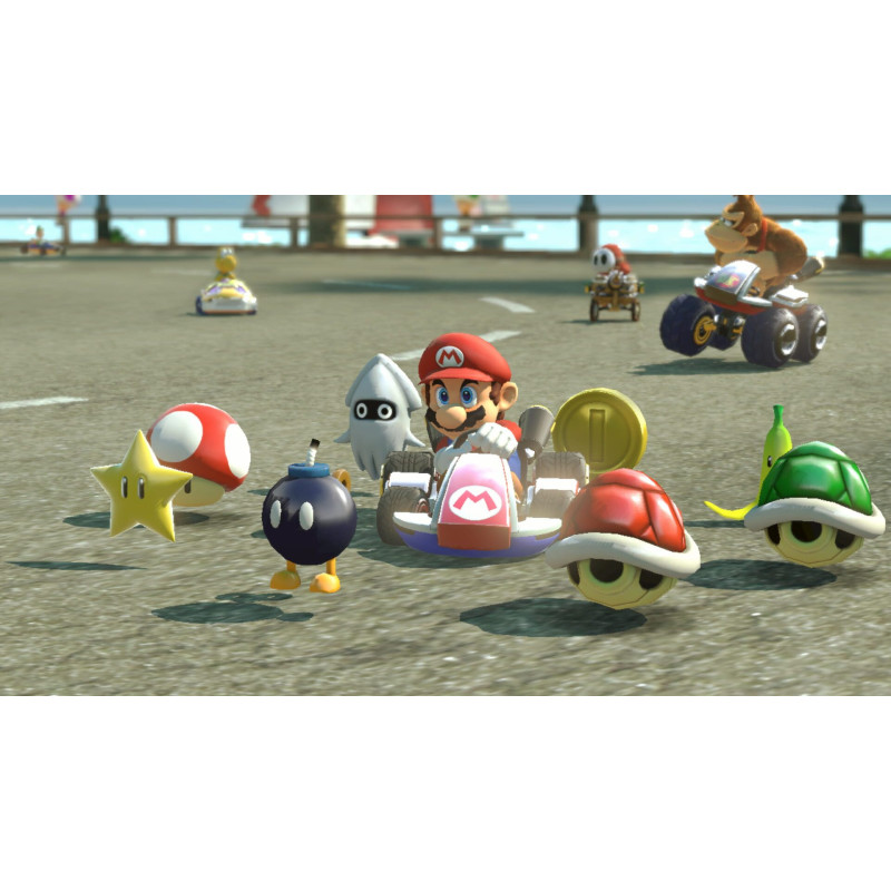 Captura de pantalla del gameplay de Mario Kart 8 Deluxe para Nintendo Switch mostrando una emocionante carrera